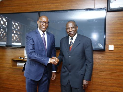 Finance Minister Matia Kasaija welcoming African Development Bank Vice- President Dr.Kevin Kariuki at MoFPED